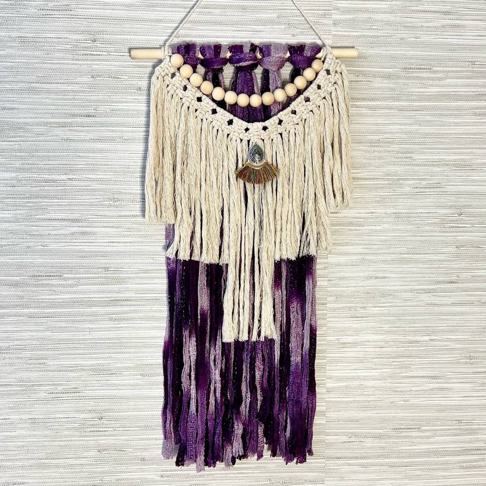 Macrame wall art. Hand crafted with colorful fibers to enhance your decor.